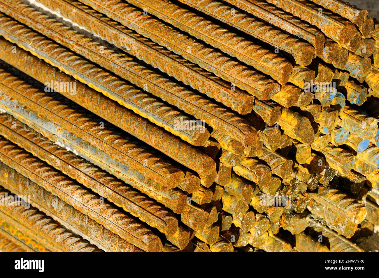 Light rusted bundle of reinforcement steel rods stored at a