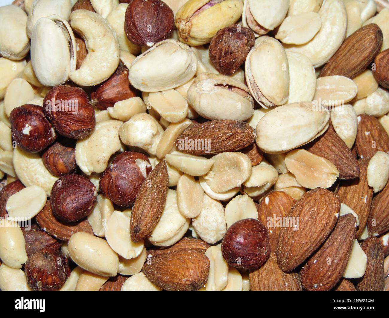 group of hazelnuts, cashews, almonds, pistachios and peanuts Stock