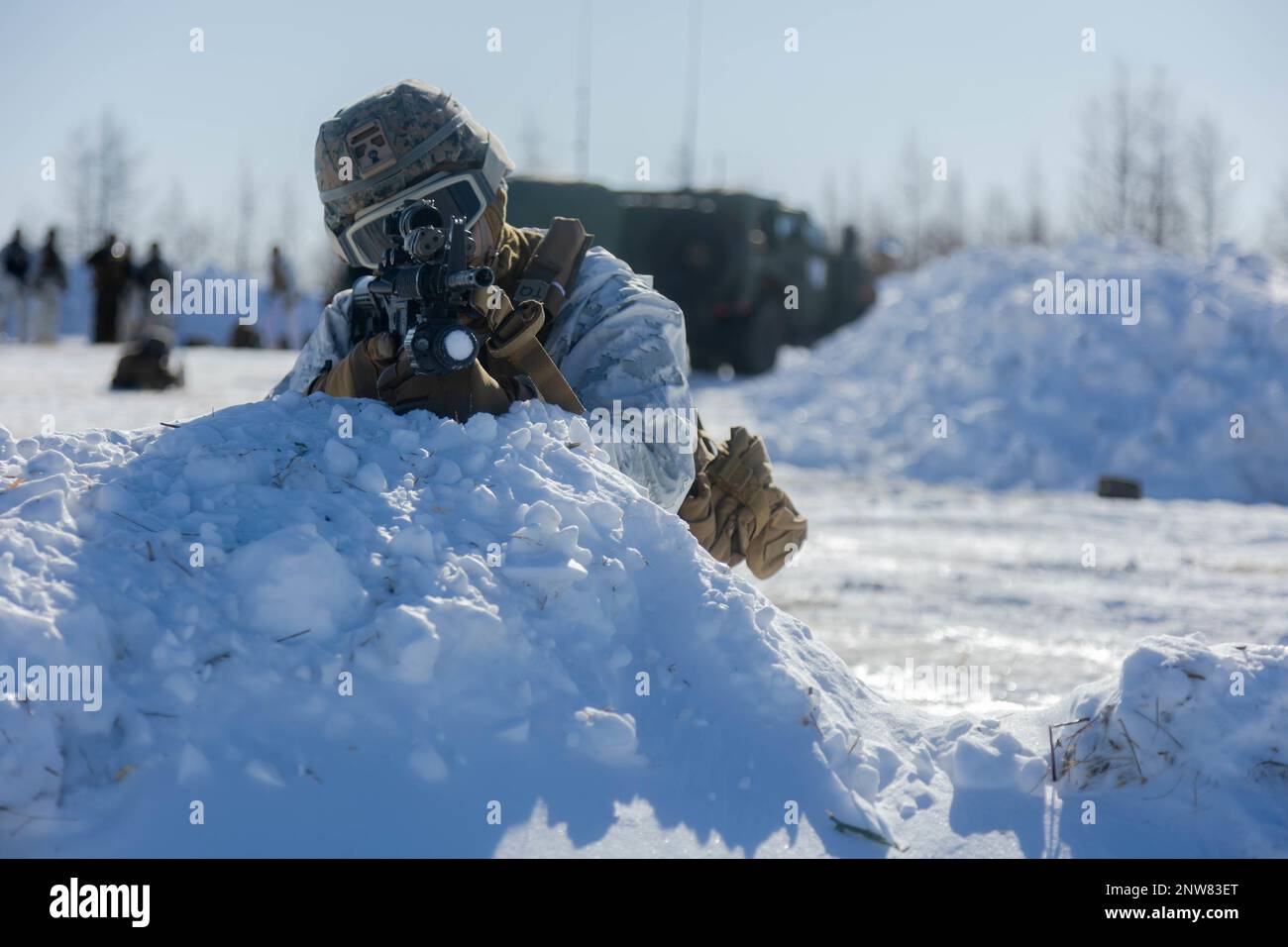 U.S. Marine Corps Lance Cpl. Brandon Nava, a supply administration and operations specialist with 3d Battalion, 12th Marines, posts security during Artillery Relocation Training Program 22.4 at the Yausubetsu Training Area, Hokkaido, Japan, Jan. 27, 2023. The skills developed at ARTP increase the proficiency and readiness of the only permanently forward-deployed artillery unit in the Marine Corps, enabling them to provide precision indirect fires. Nava is a native of El Paso, Texas. Stock Photo