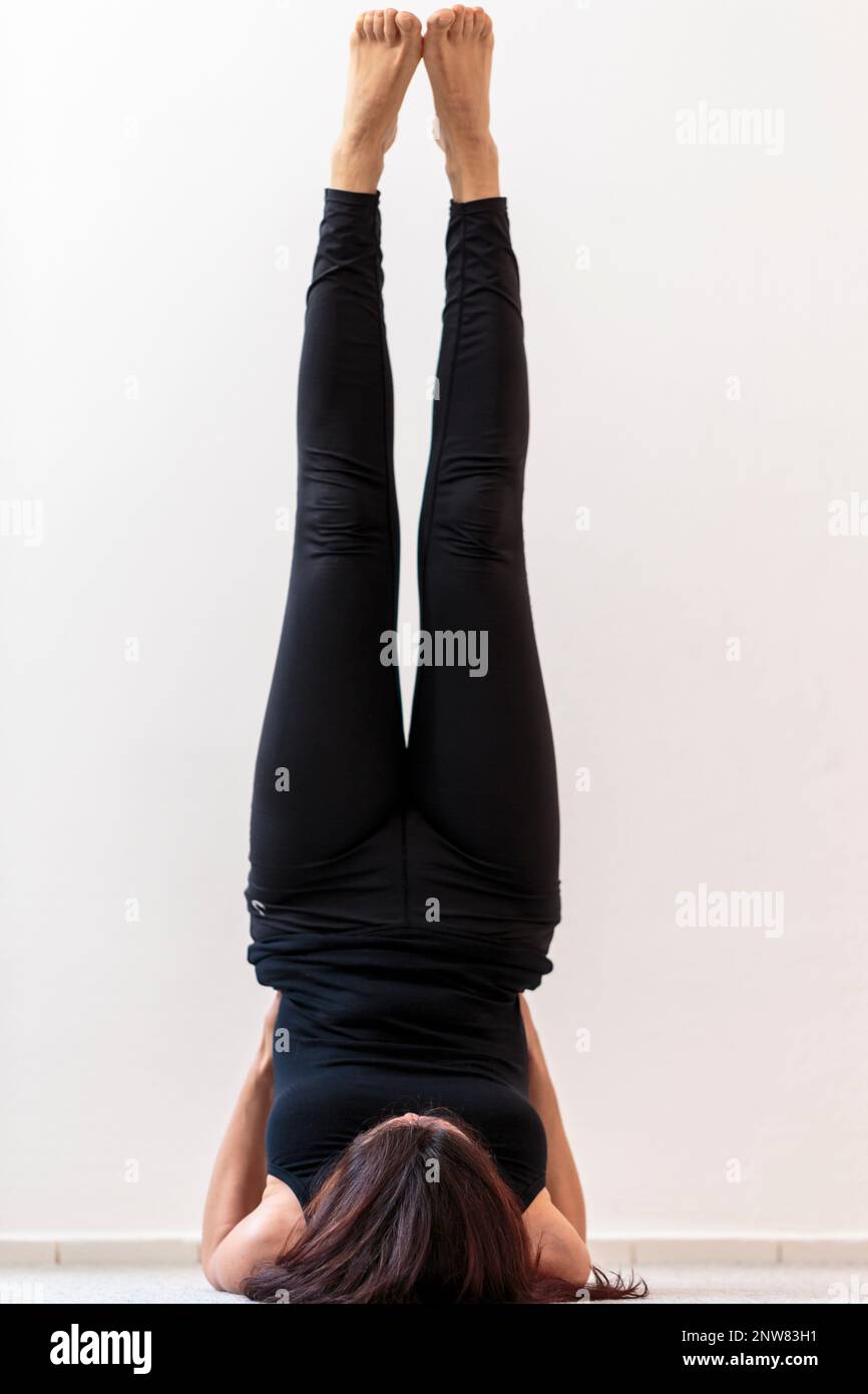 Viparita karani yoga pose hi-res stock photography and images - Alamy