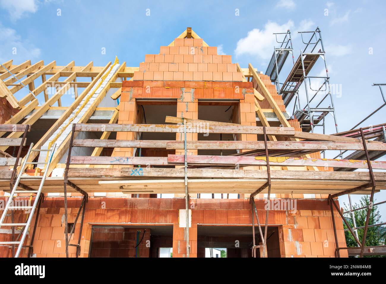unfinished residential home in construction Stock Photo
