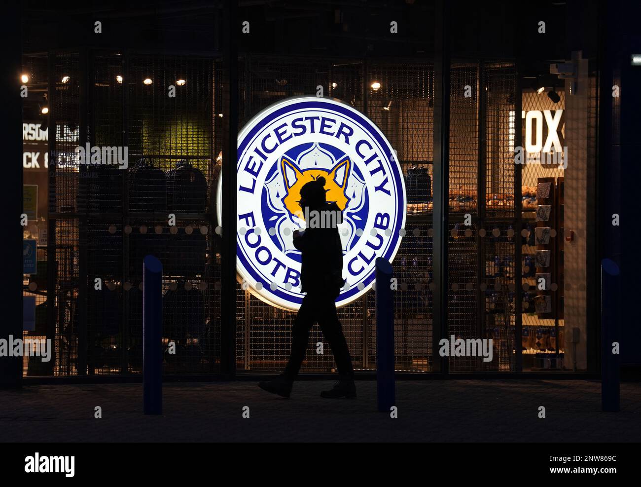 A fan walks past the Leicester City logo ahead of the Emirates FA Cup fifth round match at King Power Stadium, Leicester. Picture date: Tuesday February 28, 2023. Stock Photo