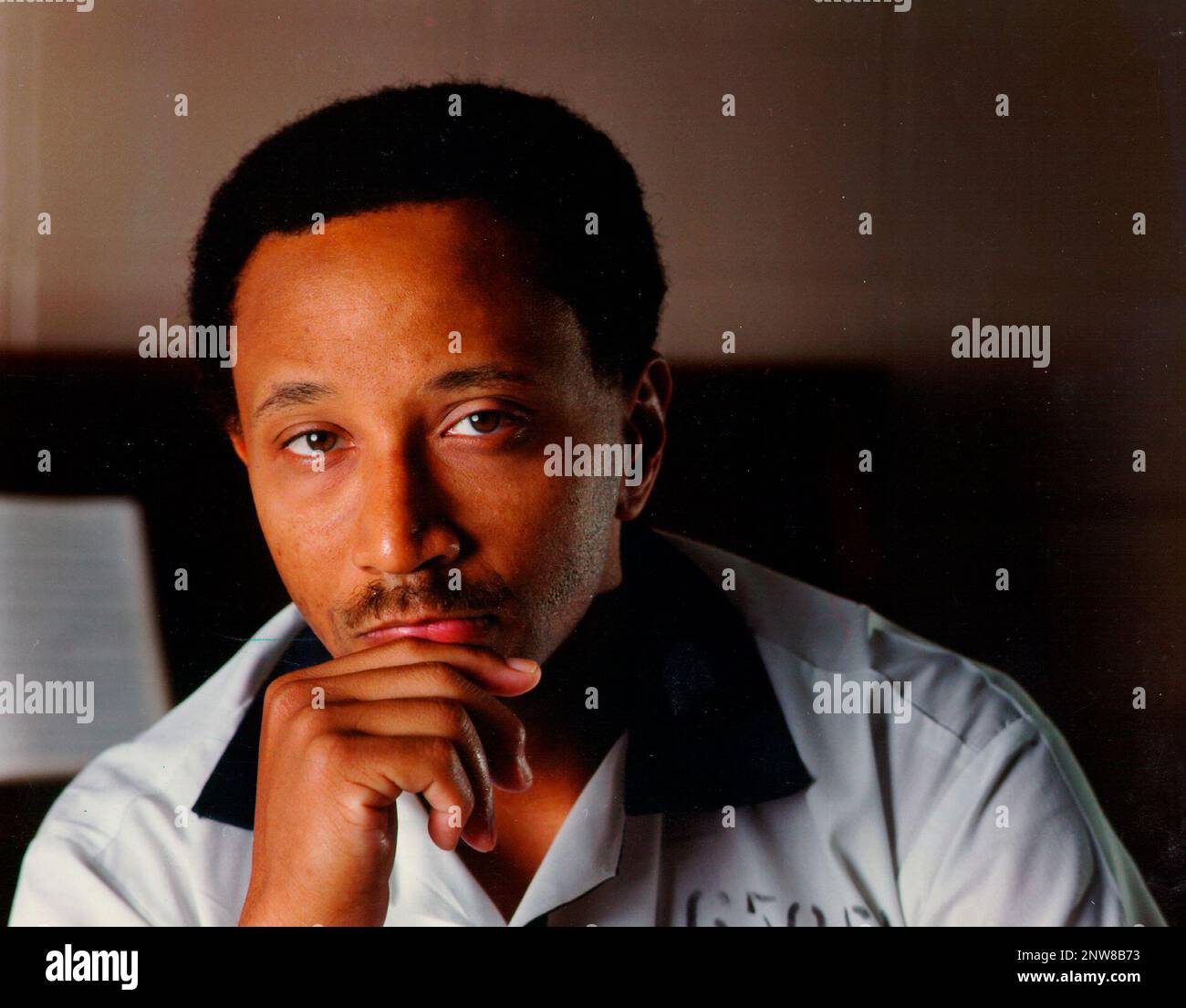 In a rare prison photograph, Wayne Williams poses in the visiting room