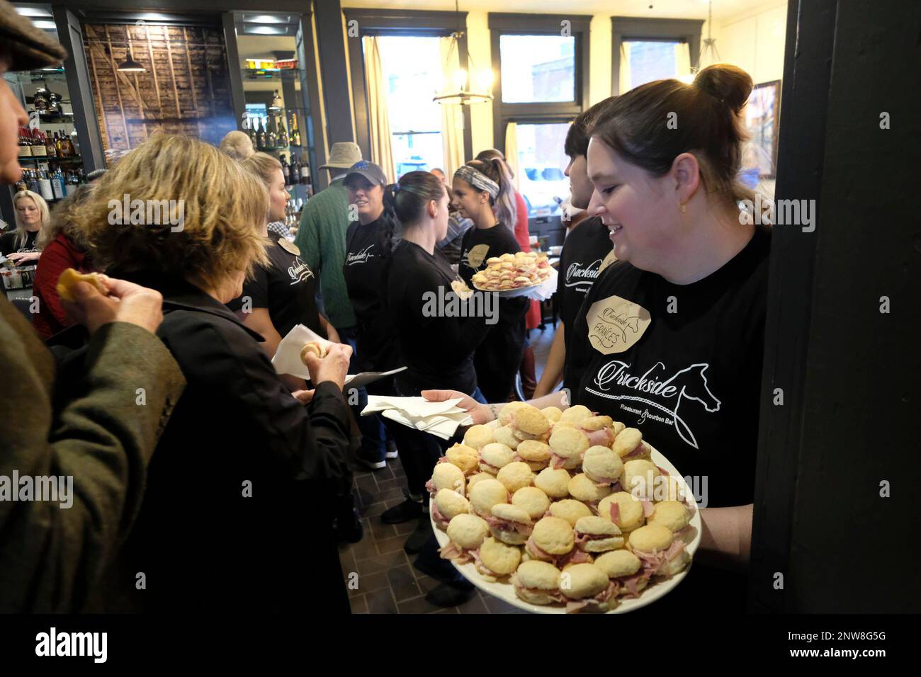 Trackside Restaurant and Bourbon Bar employees passed out country ham