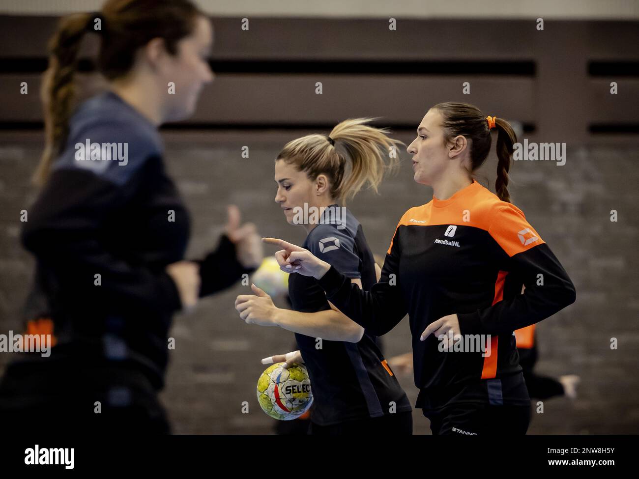 ARNHEM - Estavana Polman and Lois Abbingh of TeamNL Women's Handball during training leading up to the Golden League matches. ANP ROBIN VAN LONKHUIJSEN Stock Photo