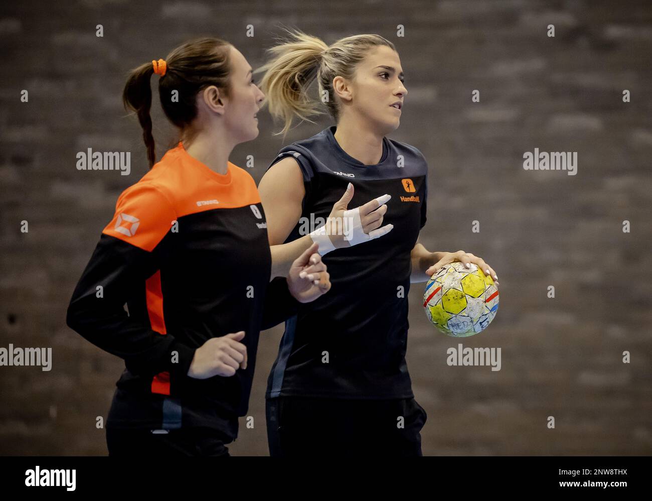 ARNHEM - Lois Abbingh and Estavana Polman of TeamNL Handball Ladies during training leading up to the Golden League matches. ANP ROBIN VAN LONKHUIJSEN Stock Photo