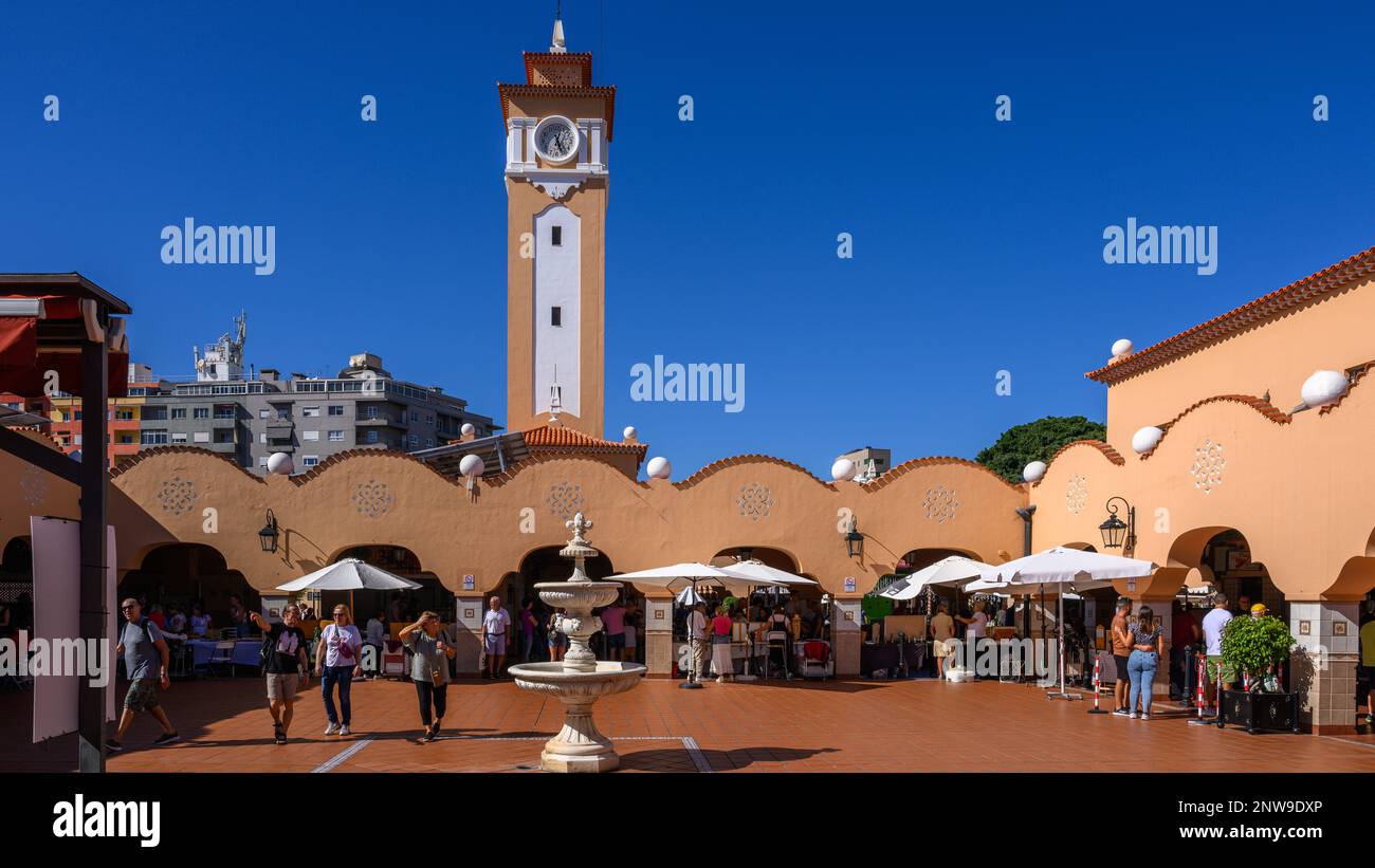 The main patio of the historic Mercado De Nuestra Senora De Africa in Santa Cruz de Tenerife, with its Mudejar style clock tower and design features. Stock Photo