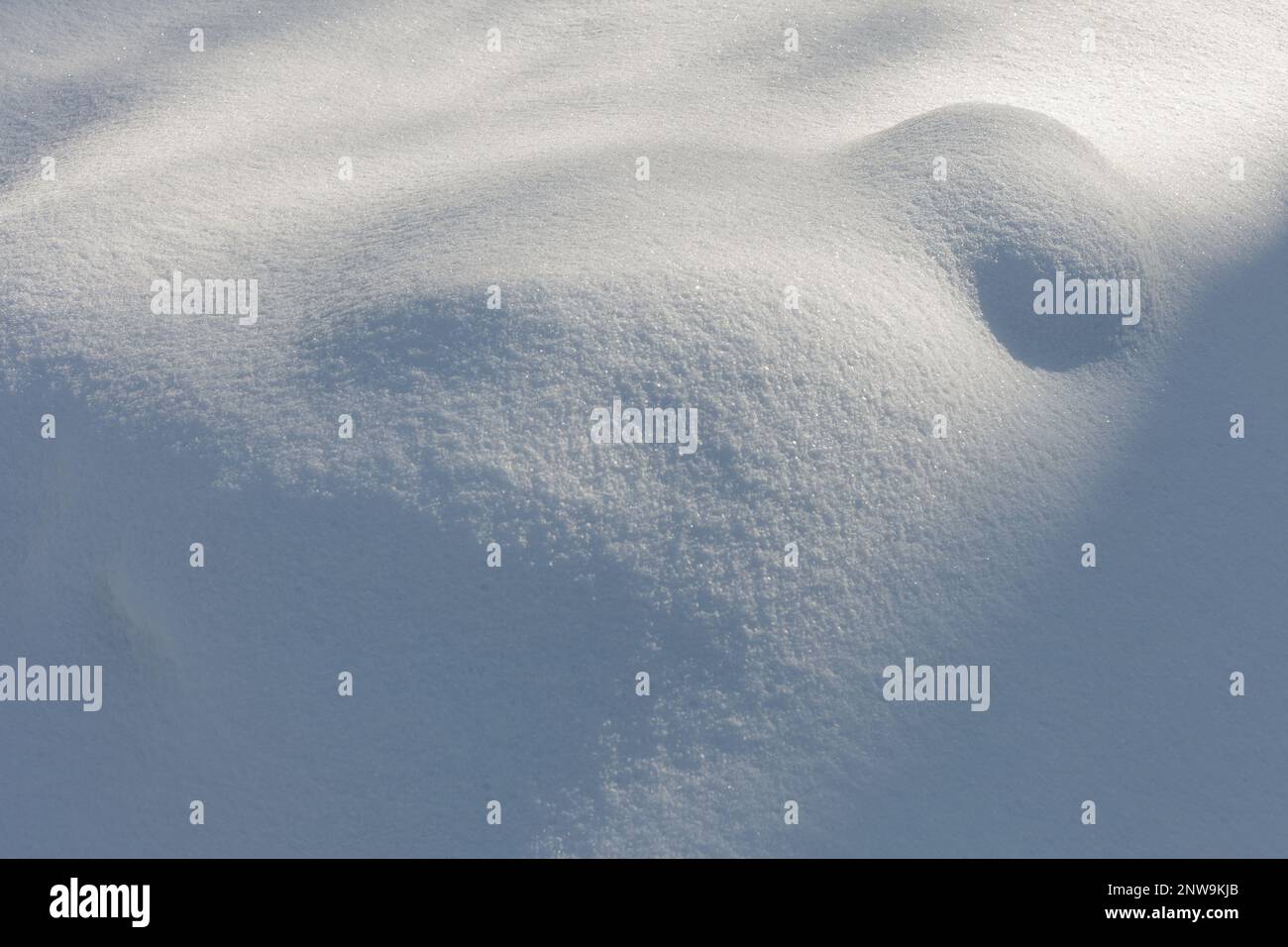 A snow covered surface of relief Stock Photo
