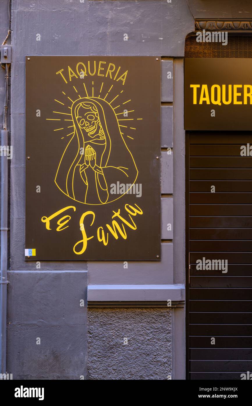 The praying nun skeleton sign of the Taqueria La Santa Mexican Restaurant in Calle del Castillo in Santa Cruz de Tenerife. Stock Photo
