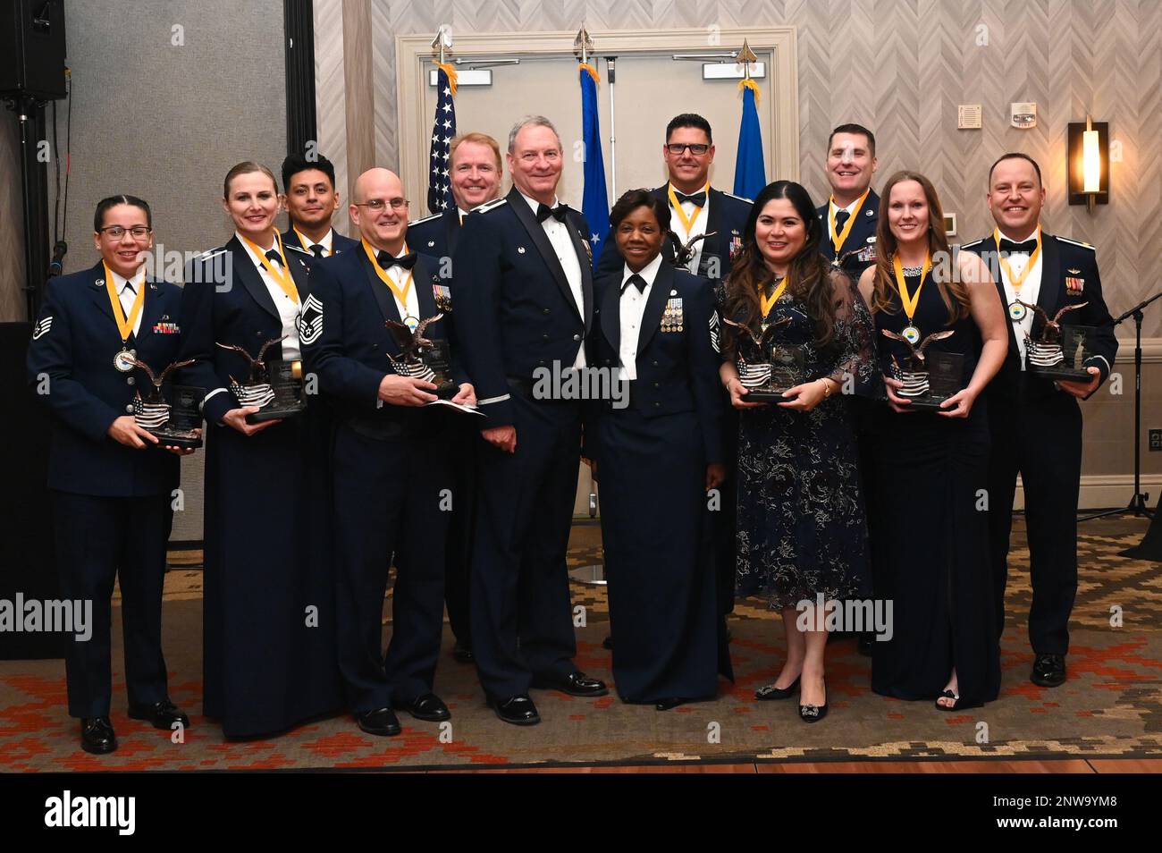 Award recipients of the 433rd Airlift Wing annual awards pose for a ...
