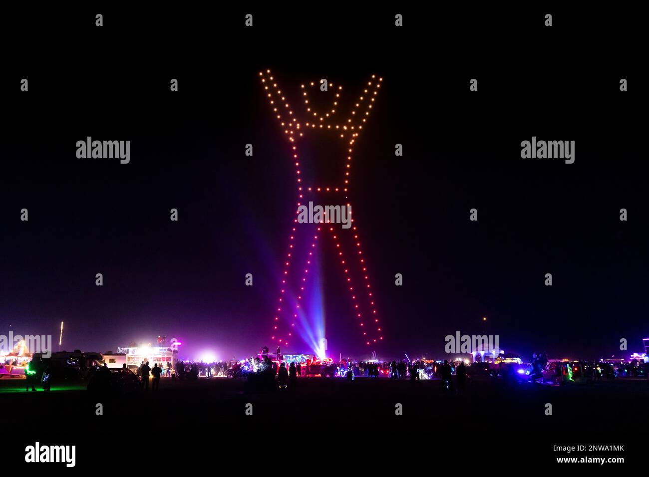 Burning Man was canceled in 2021, but thousands traveled to the Black Rock Desert anyway. In lieu of a 'man burn,' artists put on a massive drone show Stock Photo