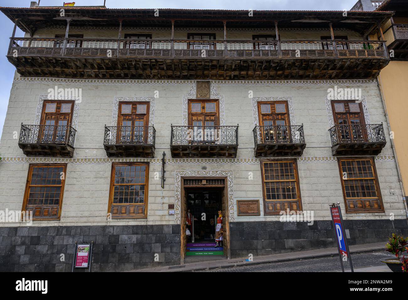 The main facade of the Casa de los Balcones in La Orotave with its ornate sgraffito motifs around the sash windows & wrought iron and wooden balconies Stock Photo