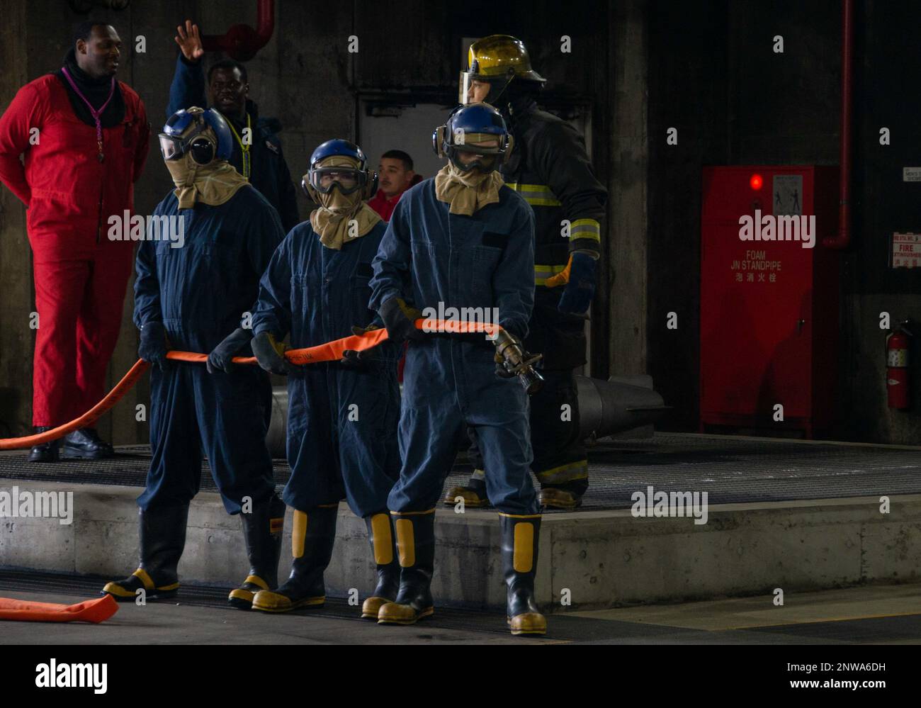 230124-N-AR554-1152 YOKOSUKA, Japan (Jan. 24, 2023) Sailors participate ...