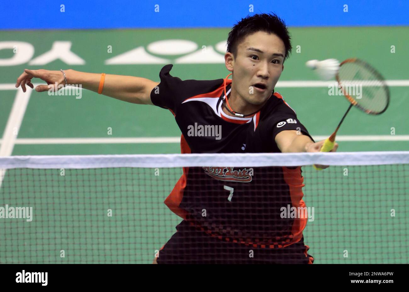 The world's top ranked Badminton player Kento Momota competes during ...