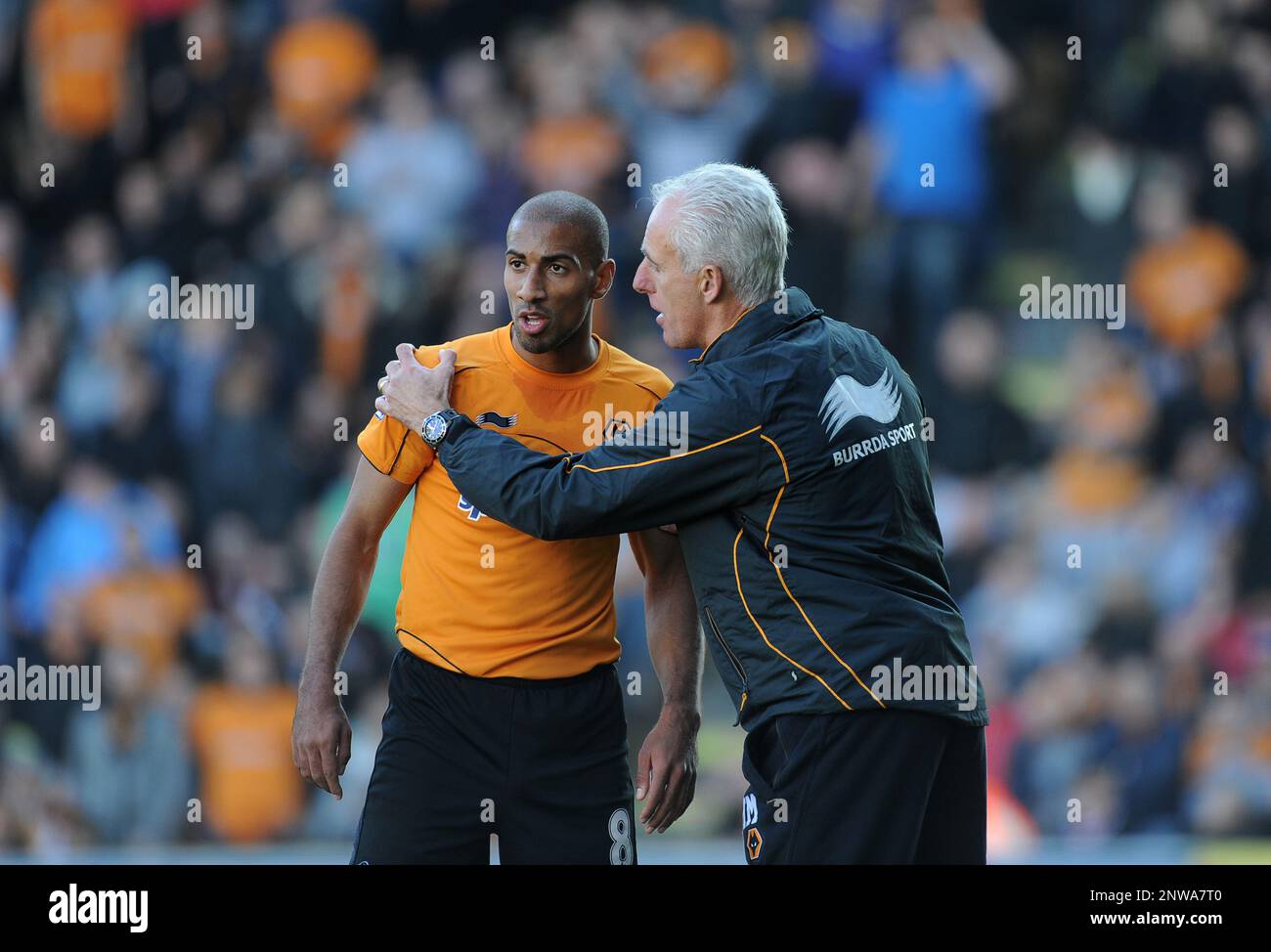 Mick McCarthy the head coach / manager of Wolverhampton Wanderers has a word with Karl Henry Wolverhampton Wanderers v Swansea 22/10/2011 Stock Photo