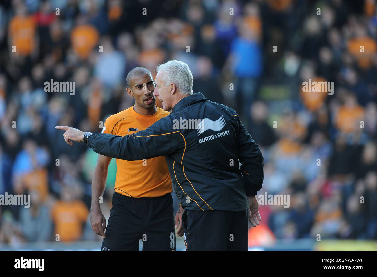 Mick McCarthy the head coach / manager of Wolverhampton Wanderers has a word with Karl Henry Wolverhampton Wanderers v Swansea 22/10/2011 Stock Photo