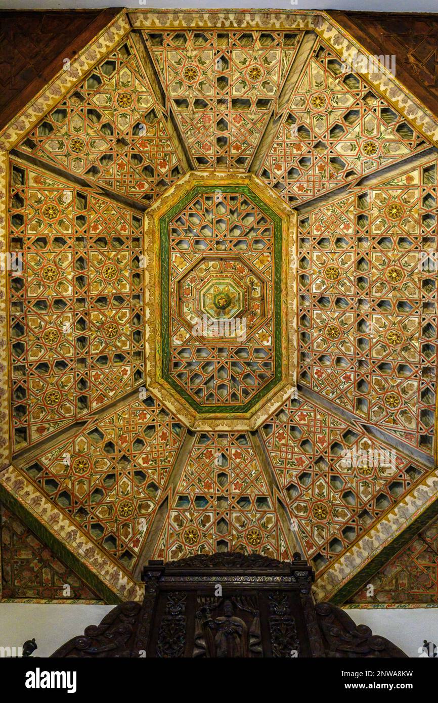 An intricate, painted, wooden, coffered ceiling in a chapel of the Church of Santo Domingo de Guzman in San Cristobal de La Laguna, Tenerife Stock Photo
