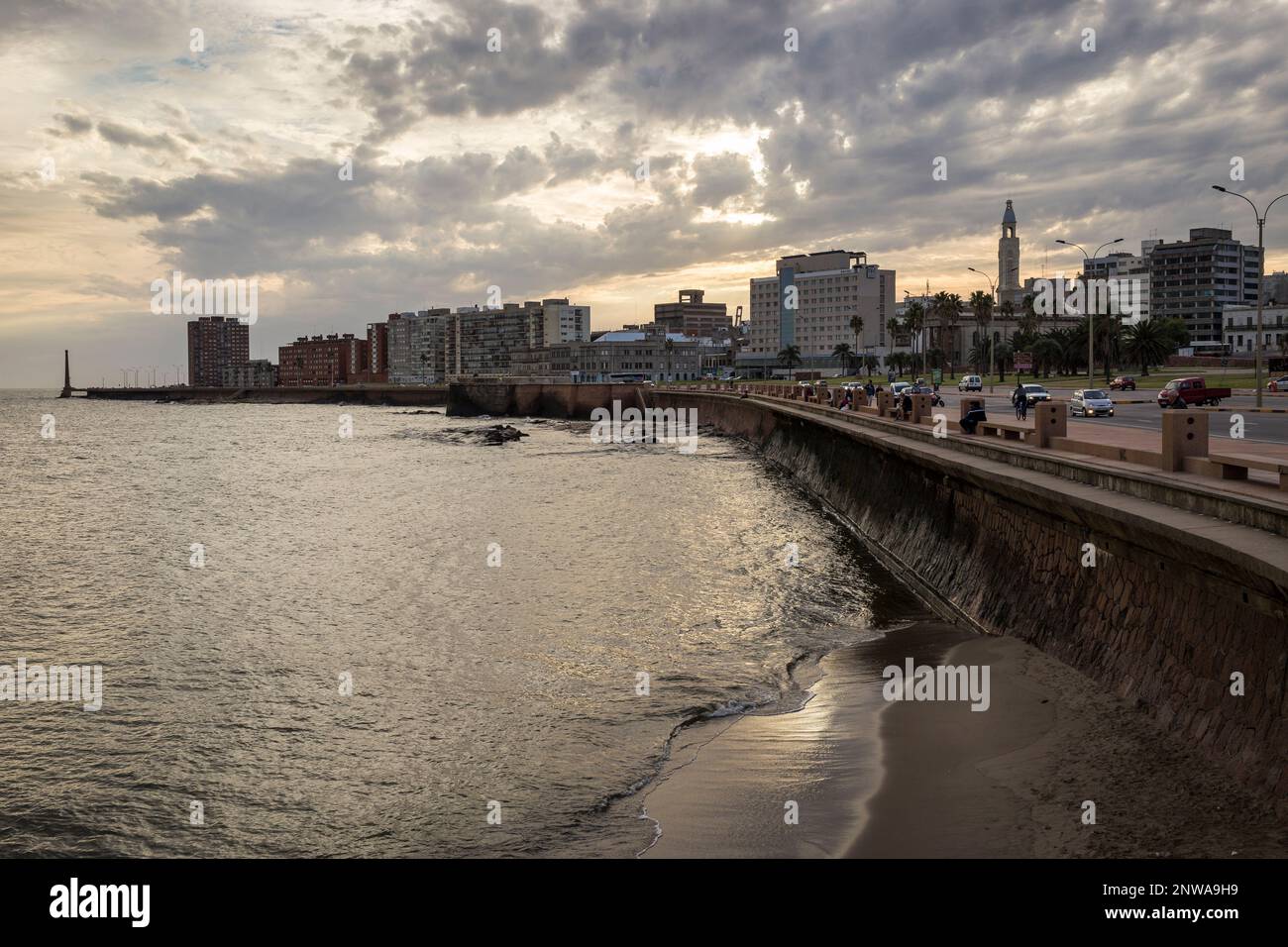 Sunset over the Rambla Gran Bretaña. The Rambla is an avenue that goes all along the coastline of Montevideo Stock Photo