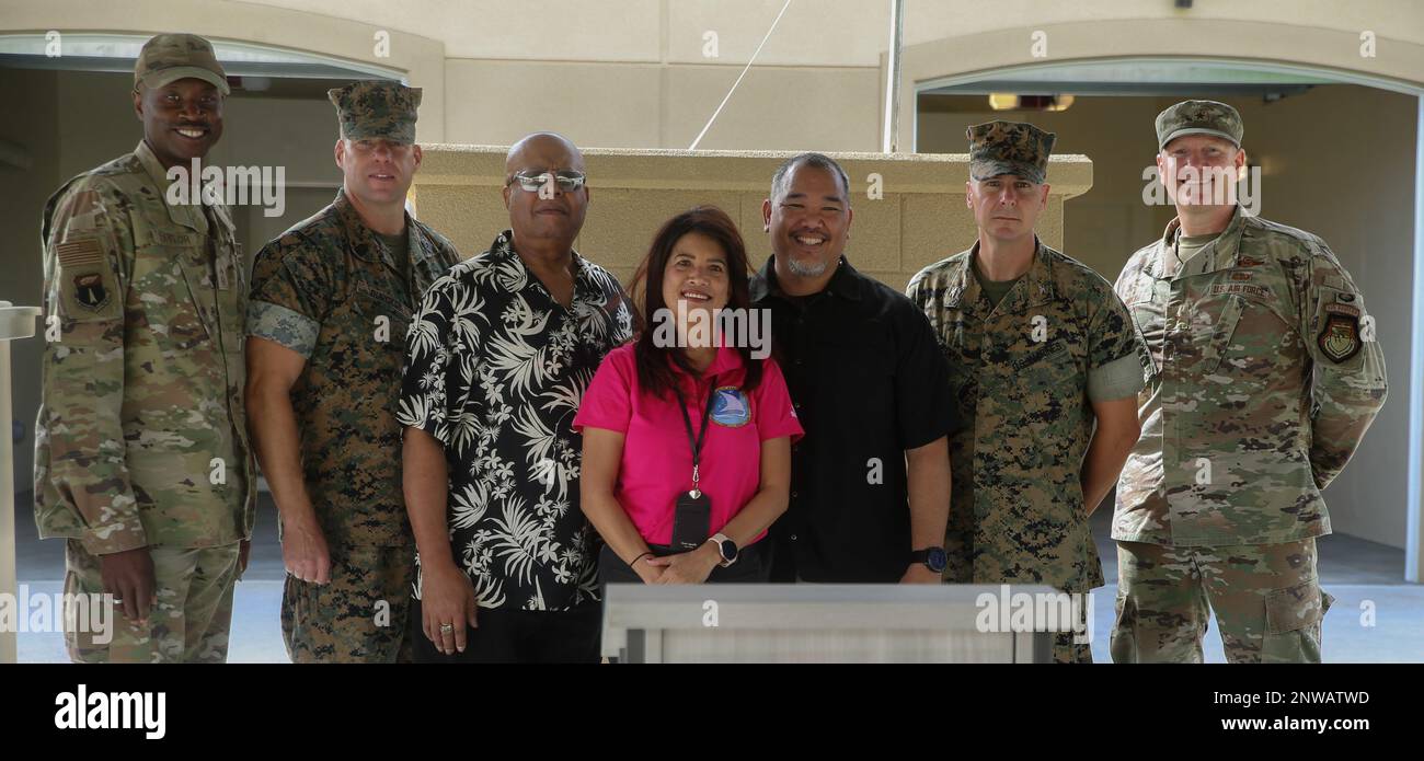 U.S. service members and members of Black Construction Corporation pose