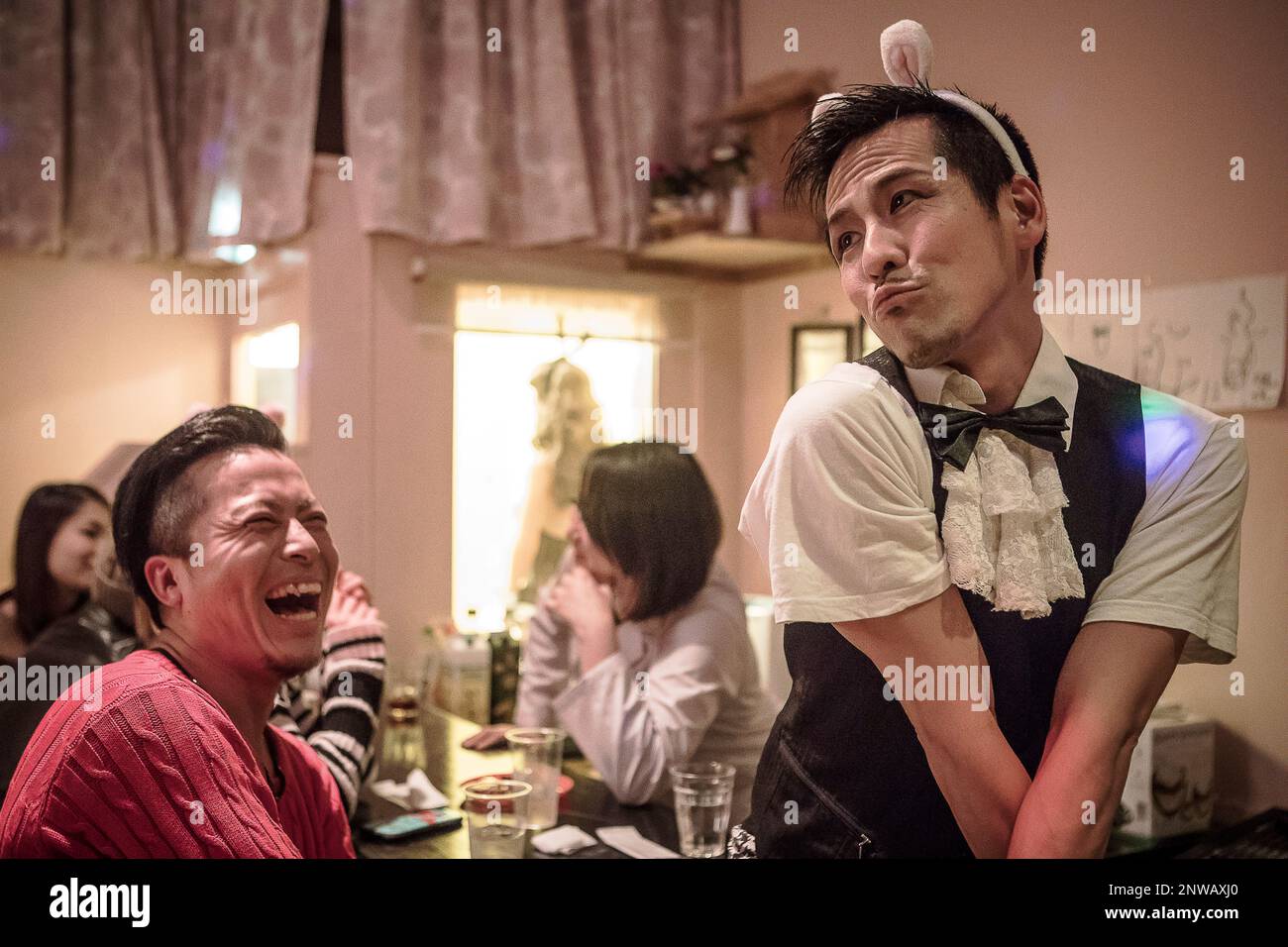 Barman, in Pink´s Bar, Gay Bar, of Nippombashi Den Den Town, Osaka, Japan, Stock Photo