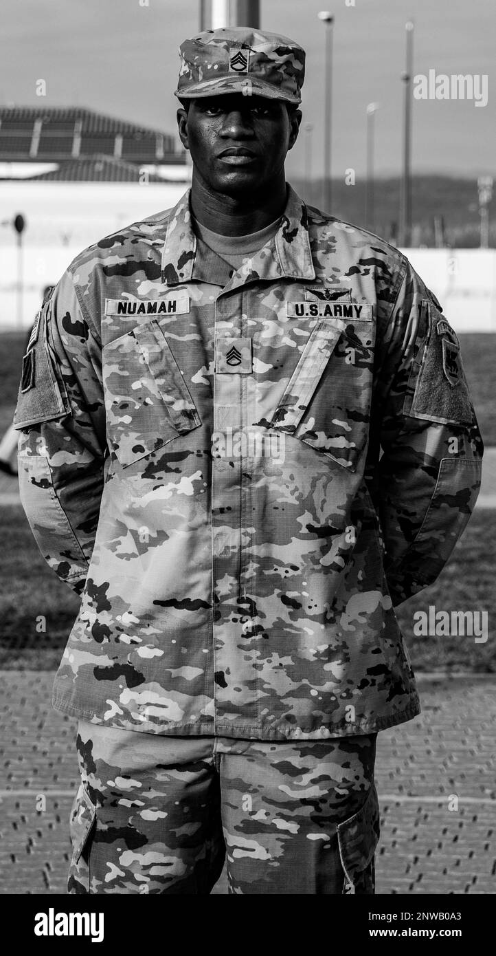 U.S Army Staff Sgt. Chief Nuamah with U.S. Army Southern European Task Force, Africa (SETAF-AF) G3 Tactical Air Command, stands by prior to his promotion to Sgt. 1st Class on Caserma Del Din, Vicenza, Italy, Jan. 27, 2023. Nuamah’s promotion to Sgt. 1st class is a result of the hard work and dedication he provides to SETAF-AF’s G3 and the Army as a whole. Stock Photo