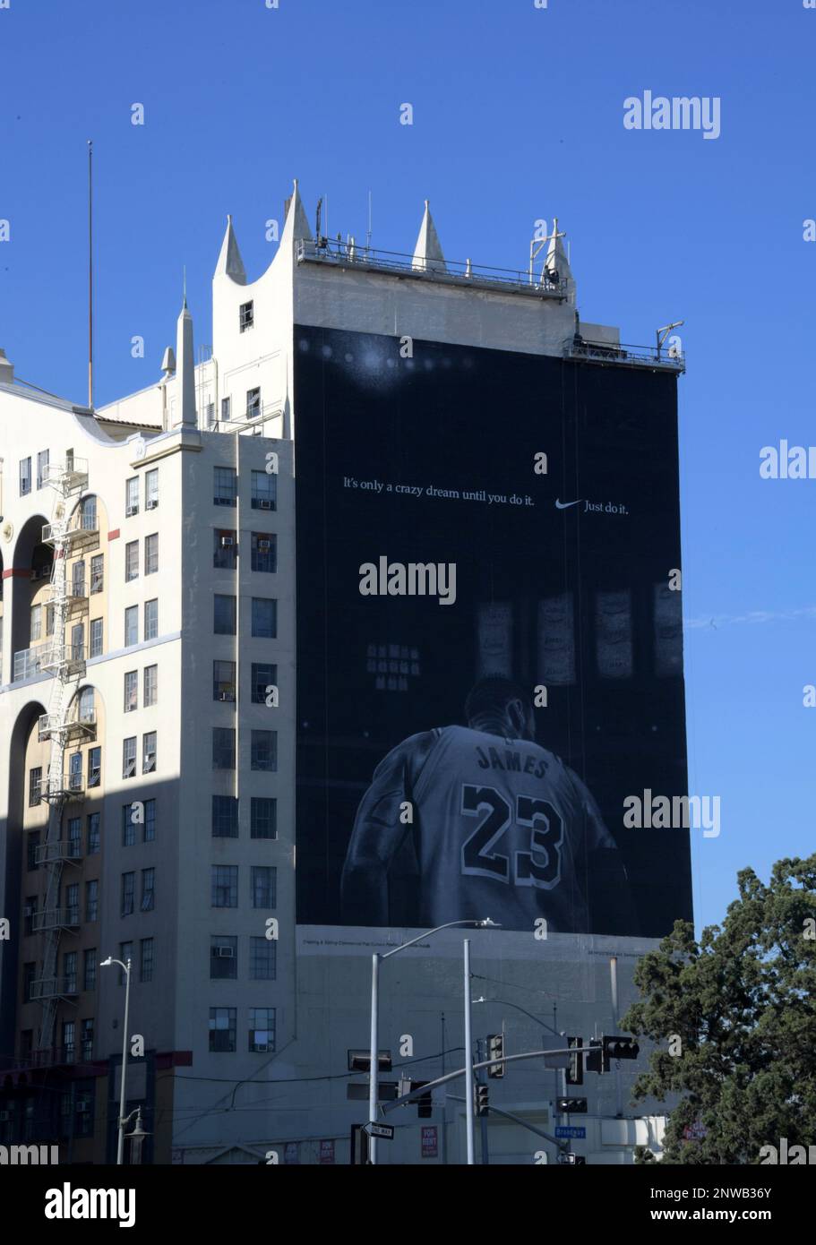 Nike ad featuring Los Angeles Lakers forward LeBron James to commemorate  the 30th anniversary of the "Just Do It" campaign on the side of building  on W. Washington Blvd. between S. Hill
