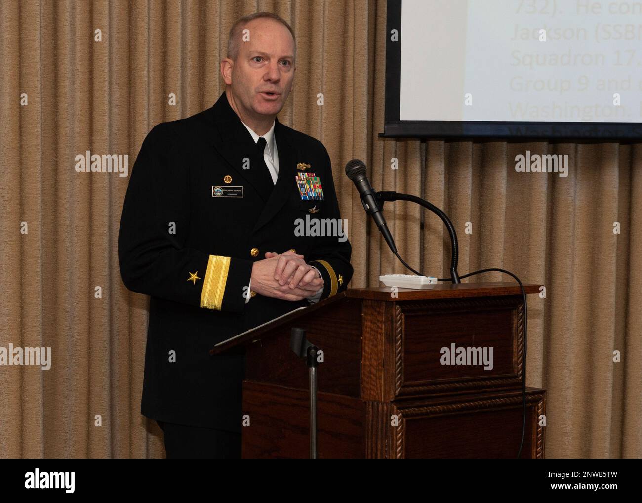 230218-N-ED185-1016  BREMERTON, Wash. (Feb. 18, 2023) Rear Adm. Mark Behning, commander, Submarine Group 9, speaks during the Junior Science and Humanities Symposium (JSHS) in Bremerton, Washington, February 18, 2023. The JSHS is a Department of Defense sponsored science, technology, engineering and mathematics (STEM) program that encourages high school students to conduct original research in the fields of STEM. Stock Photo