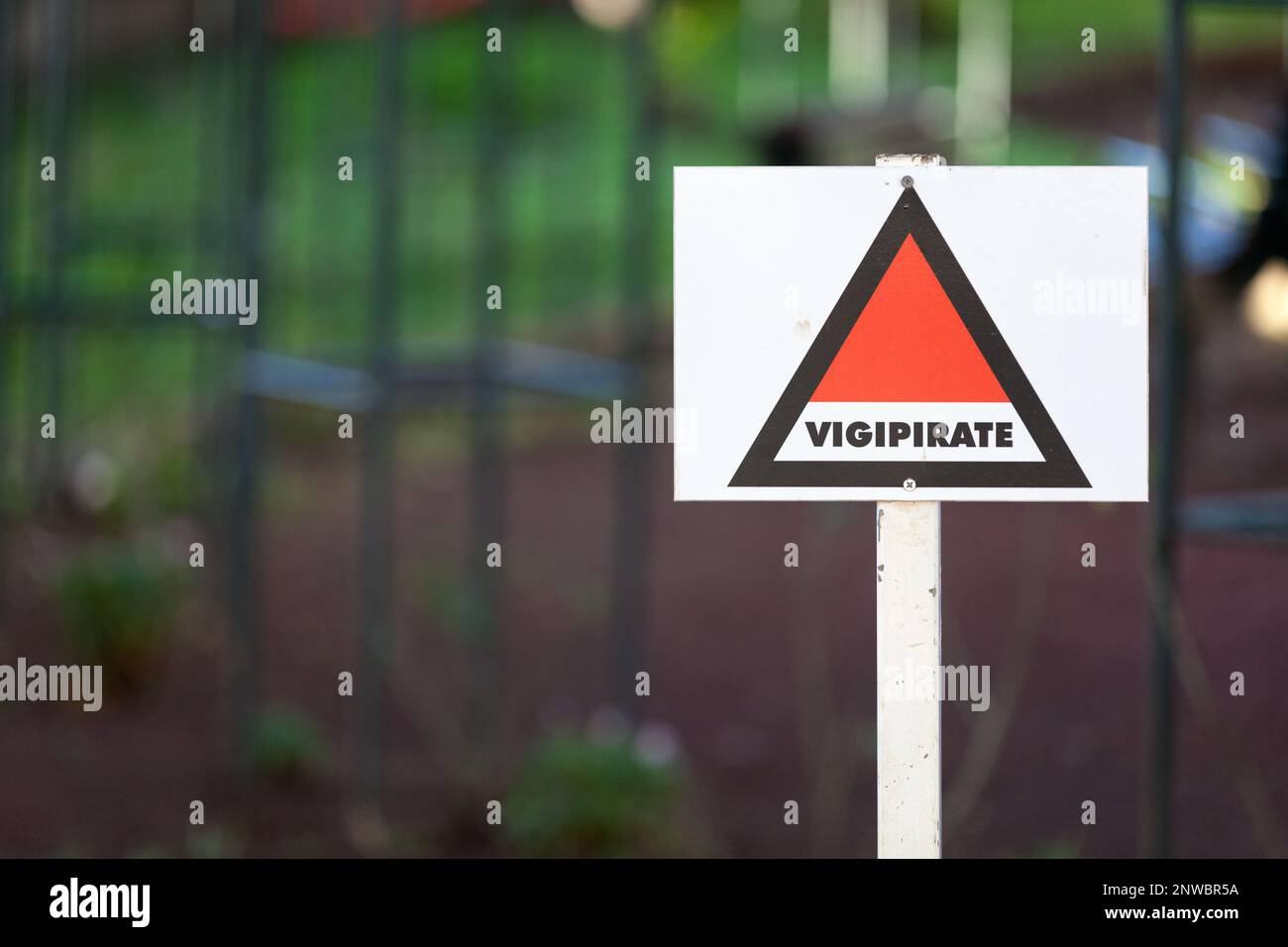 Triangular sign outside a school for the Vigipirate plan, the France's national security alert system against terrorist threats. Stock Photo