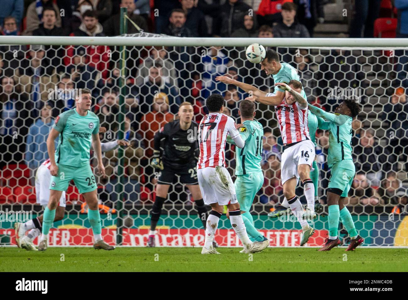 28th February 2023; Bet365 Stadium, Stoke, Staffordshire, England; FA Cup Football, Stoke City versus Brighton and Hove Albion; Lewis Dunk of Brighton heads the ball clear Stock Photo