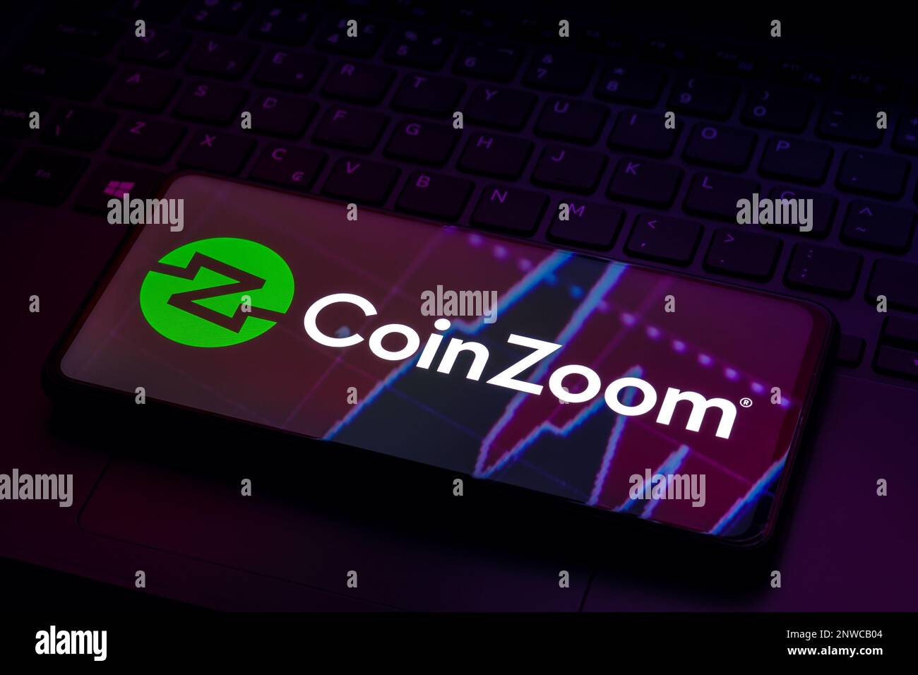 In this photo illustration, the CoinZoom logo seen displayed on a