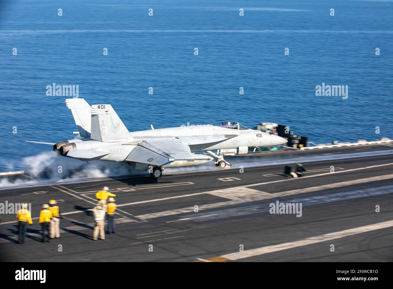 230105-N-EL850-2016 TYRRHENIAN SEA (Jan. 5, 2023) An F/A-18E Super Hornet attached to Strike Fighter Squadron (VFA) 136, launches from the flight deck of the Nimitz-class aircraft carrier USS George H.W. Bush (CVN 77), Jan. 5, 2023. Carrier Air Wing (CVW) 7 is the offensive air and strike component of CSG-10 and the George H.W. Bush CSG. The squadrons of CVW-7 are Strike Fighter Squadron (VFA) 143, VFA-103, VFA-86, VFA-136, Carrier Airborne Early Warning Squadron (VAW) 121, VAQ-140, Helicopter Sea Combat Squadron (HSC) 5, and Helicopter Maritime Strike Squadron (HSM) 46. The George H.W. Bush C Stock Photo