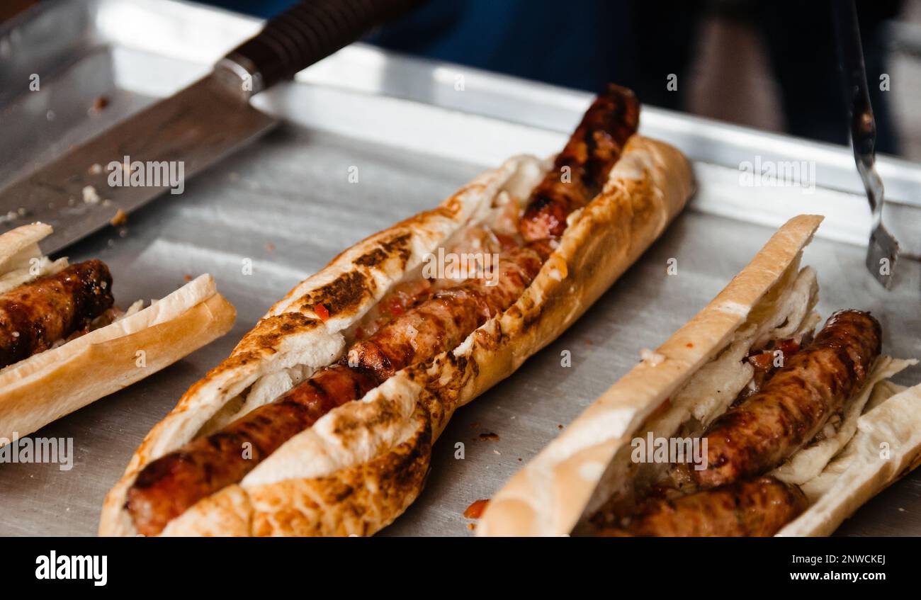 preparation of chorizo with bread ready to serve and enjoy Stock Photo ...