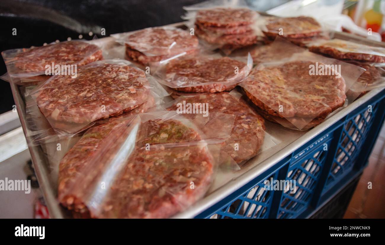 preparation of a rich and delicious hamburger to share with your close friends Stock Photo