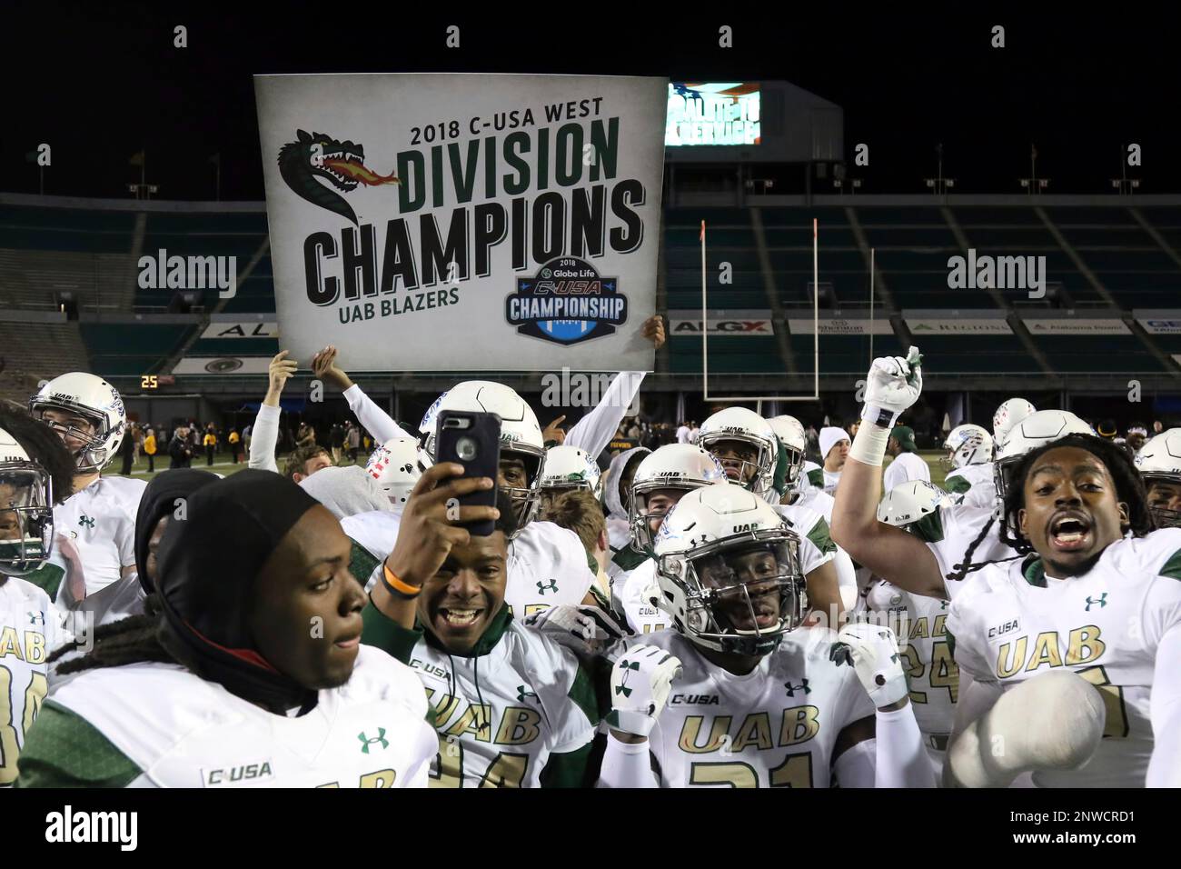 https://c8.alamy.com/comp/2NWCRD1/birmingham-al-november-10-uab-blazers-hold-up-a-sign-after-winning-the-c-usa-west-division-after-the-game-between-the-uab-blazers-and-the-southern-miss-golden-eagles-at-legion-field-in-birmingham-alabama-photo-by-michael-wadeicon-sportswire-icon-sportswire-via-ap-images-2NWCRD1.jpg