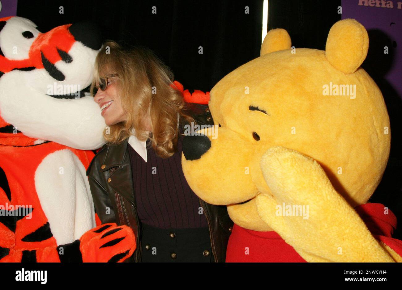 Carly Simon with Tigger and Winnie the Pooh at the premiere of 'Pooh's Heffalump Movie' at Loews Lincoln Square Theatre in New York City on February 5, 2005.  Photo Credit: Henry McGee/MediaPunch Stock Photo