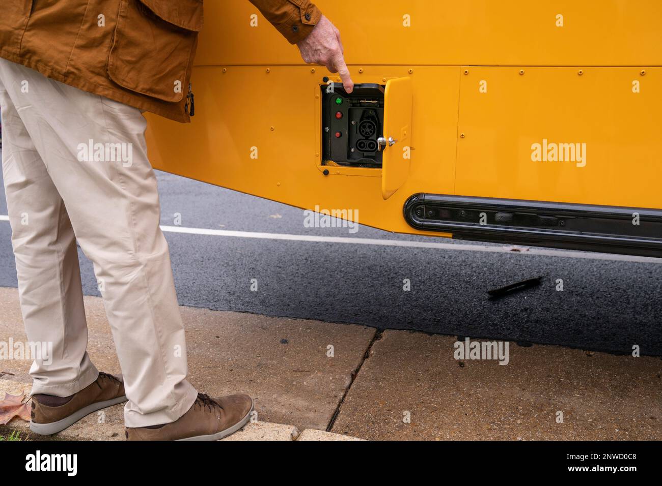 The charging port of a new electric school bus at John Lewis Elementary School in Washington, DC on October 26, 2022. The Biden administration will grant $1 billion to school districts to buy electric buses. Credit: Sarah Silbiger/CNP /MediaPunch Stock Photo