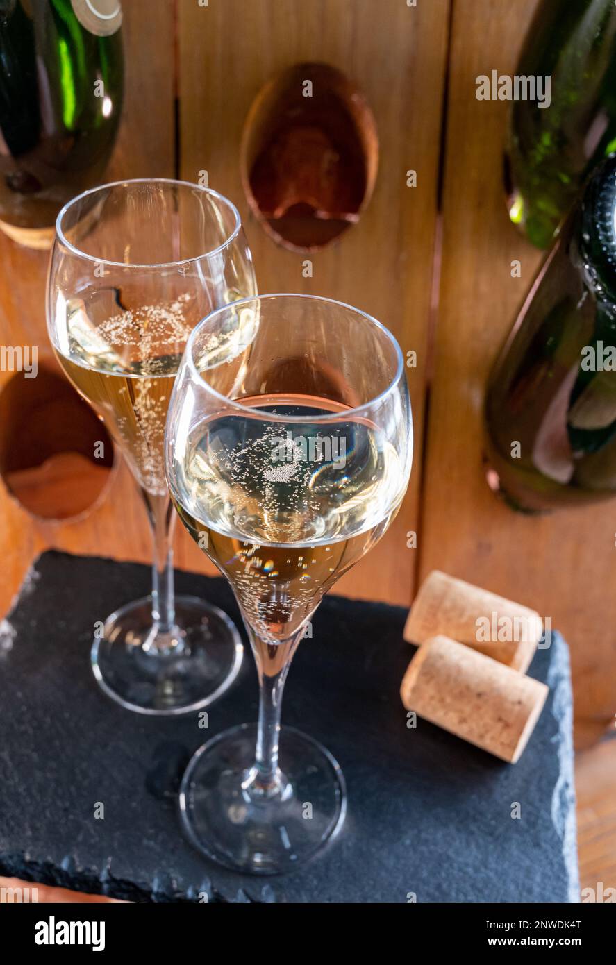 Glasses of sparkling white wine champagne gran cru or cava with bubbles