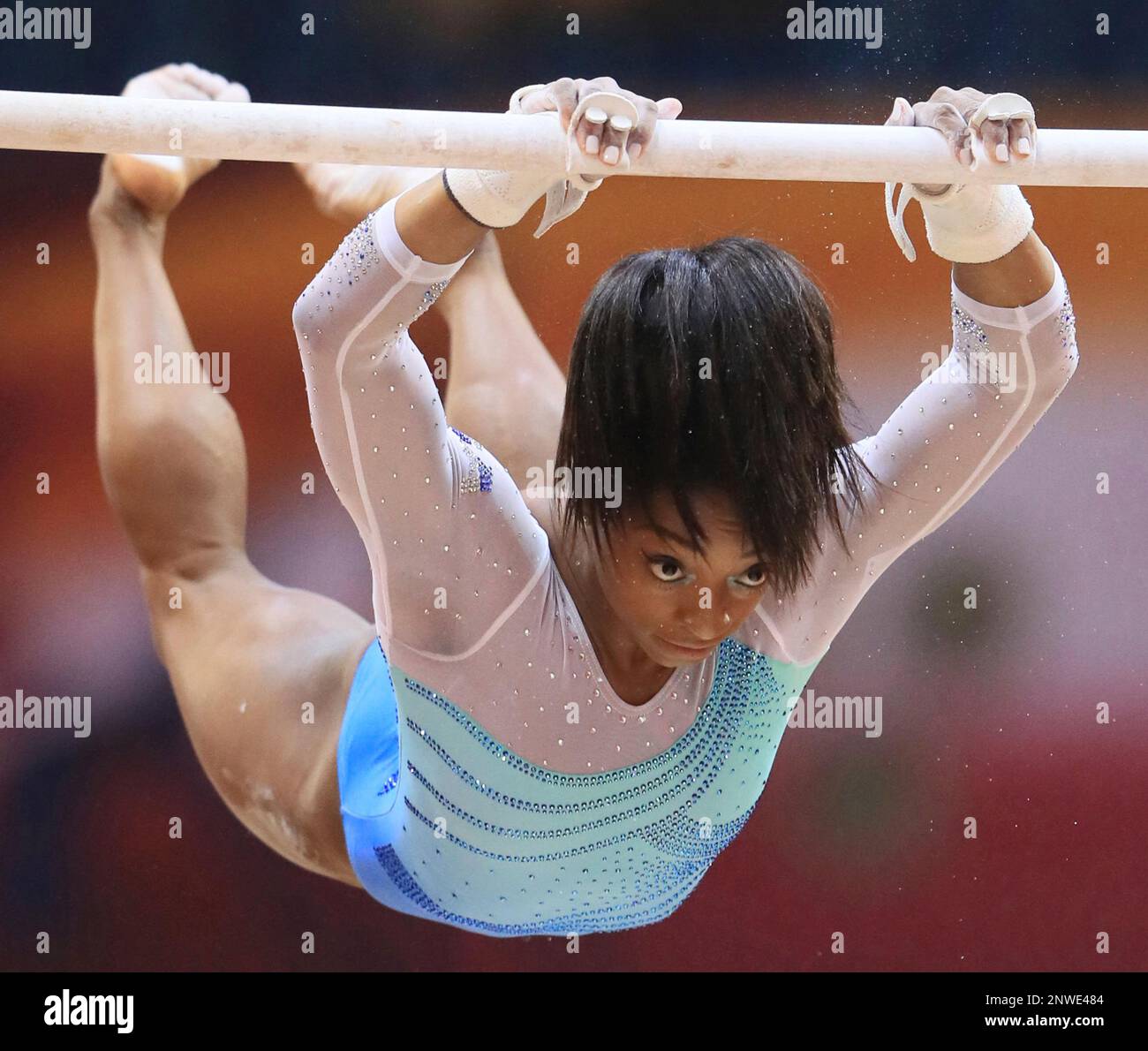 U.S. Simone Biles performs uneven parallel bars during the women
