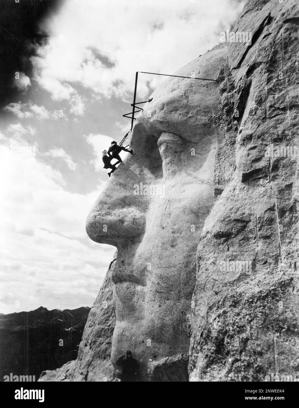 Mt. Rushmore, Mount Rushmore, Mount Rushmore National Memorial, Gutzon Borglum inspecting work on face of George Washington, Mt. Rushmore, America Stock Photo