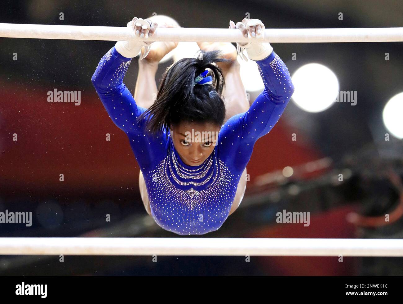U.S. Simone Arianne Biles performs on uneven parallel bars during the women
