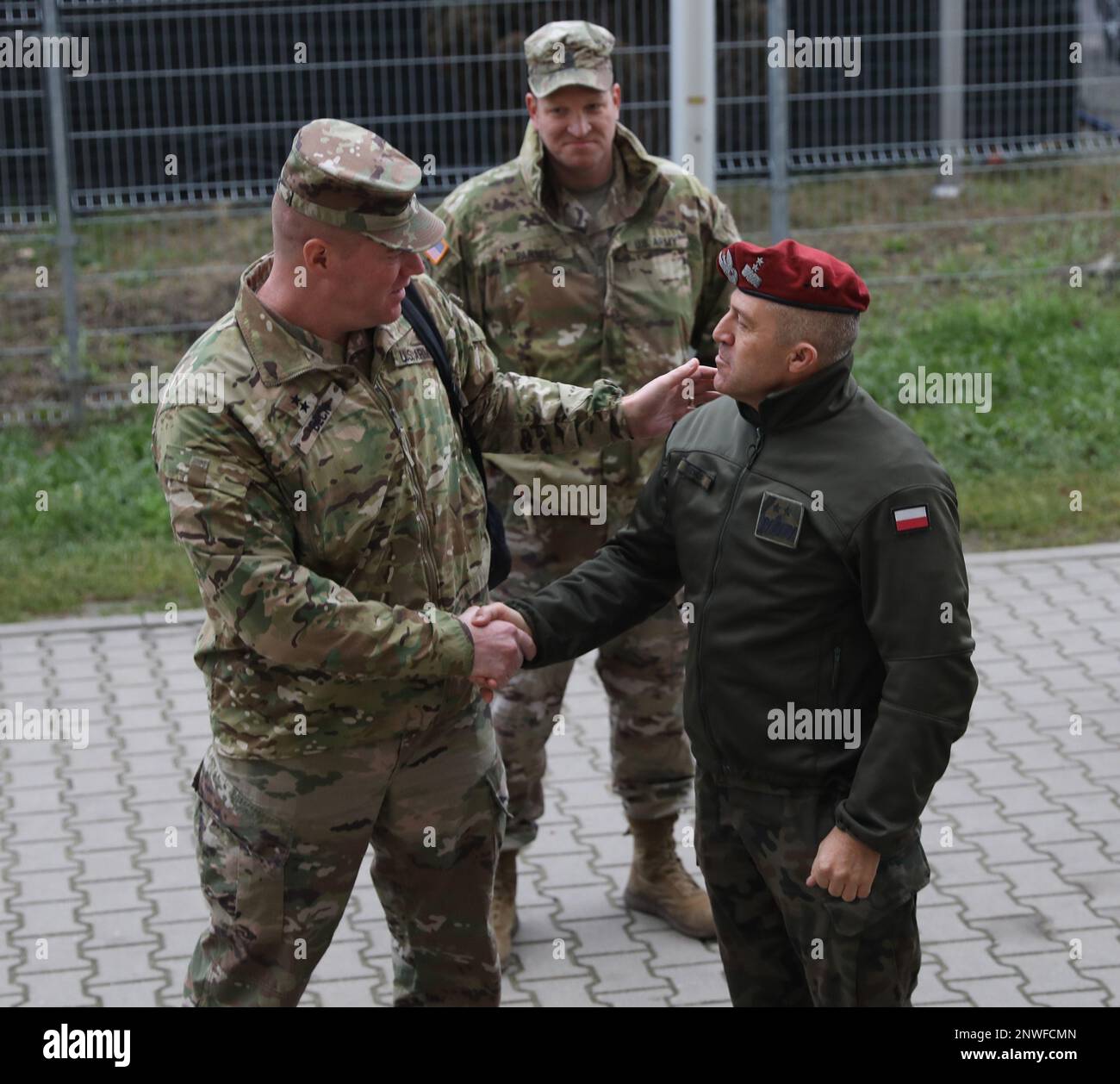 Polish Maj. Gen. Adam Joks, deputy commanding general interoperability, welcomes U.S. Army Maj. Gen. Christopher G. Beck, deputy commanding general of maneuver for the III Armored Corps, during a visit to Camp Kosciuszko, Poznan, Poland, Jan. 9, 2023. III Armored Corps is the world's premier mounted force, highly lethal, trained and ready to conduct sustained, expeditionary, operational maneuver anywhere in the world. Stock Photo