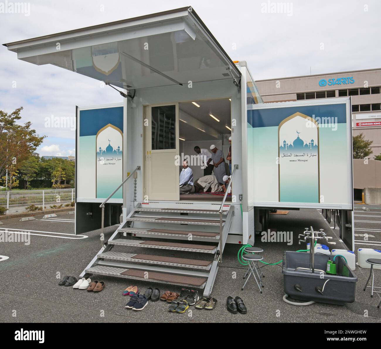 Mobile Mosque Solves Muslims who live in Japan pray at a mobile mosque in Urayasu, Chiba ...