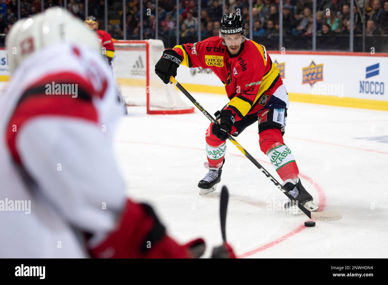 New Jersey Devils Nico Hischier goes for the puck during a NHL friendly  game between Switzerland's SC Bern and New Jersey Devils, in Bern,  Switzerland, Monday, Oct. 1, 2018. (Anthony Anex/Keystone via