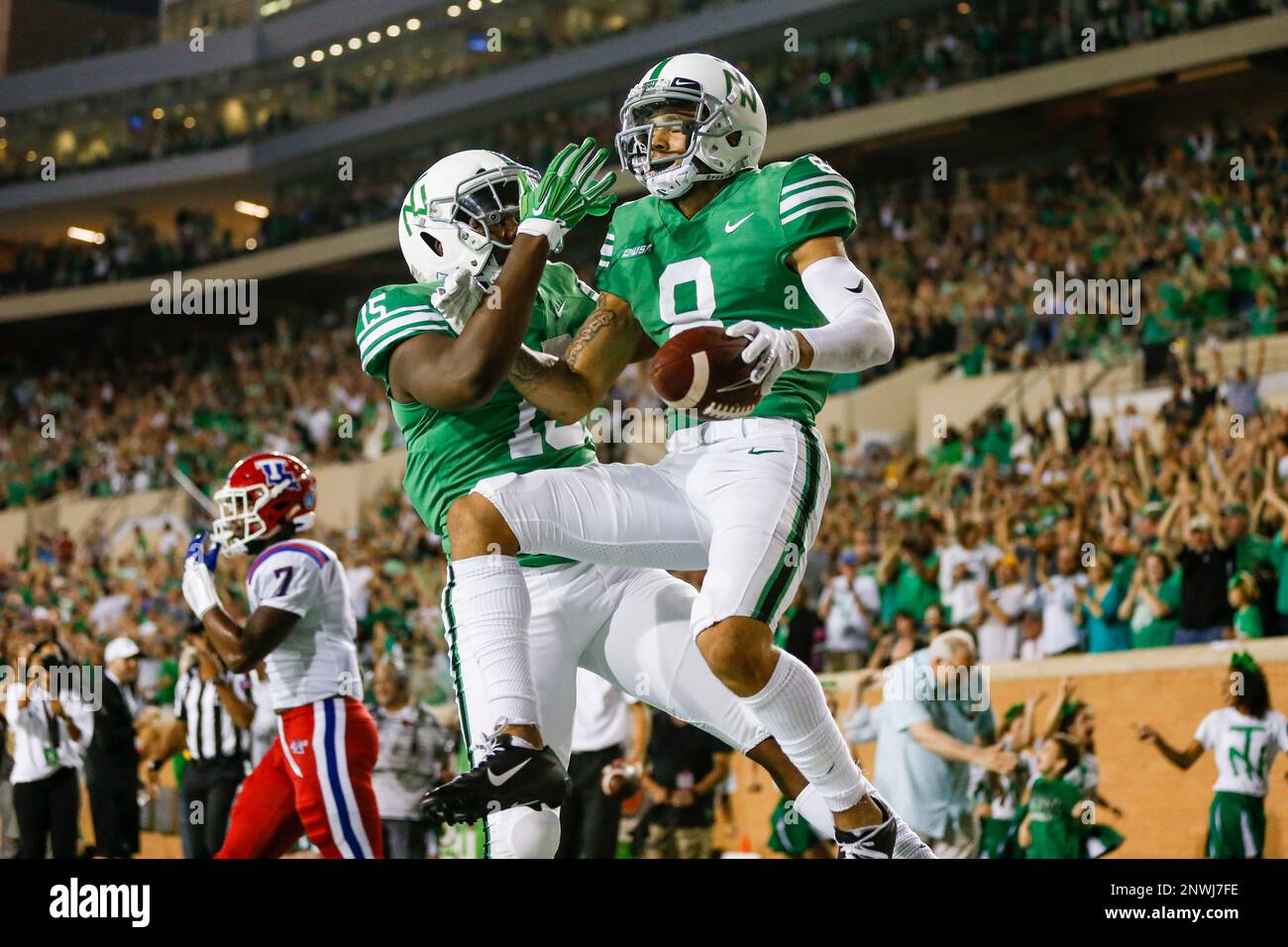 DENTON, TX - SEPTEMBER 29: North Texas Mean Green wide receiver Rico Bussey  Jr. (8) scores a touchdown and celebrates with tight end Caleb Chumley (15)  during the game between the North