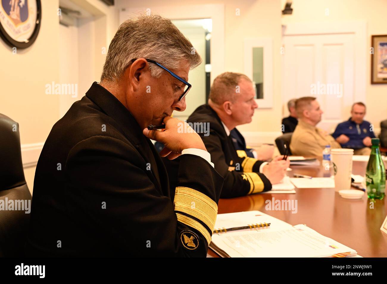 230207-N-OC941-0159  SAINT AUGUSTINE, Fla. - (Feb. 7, 2023) - Ecuadorian Navy Rear Adm. Jaime Patricio Vela Erazo, Chief of Staff of the Ecuadorian Navy (left), and U.S. Navy Rear Adm. James Aiken, Commander, U.S. Naval Forces Southern Command and U.S. 4th Fleet (center), engage in discussions at the U.S.-Ecuador Maritime Staff Talks hosted by U.S. Naval Forces Southern Command and U.S. Navy 4th Fleet at the Florida National Guard Headquarters in St. Augustine, Fla., Feb. 7 2023. Maritime Staff Talks support U.S. joint and combined maritime strategy by building and strengthening working relati Stock Photo