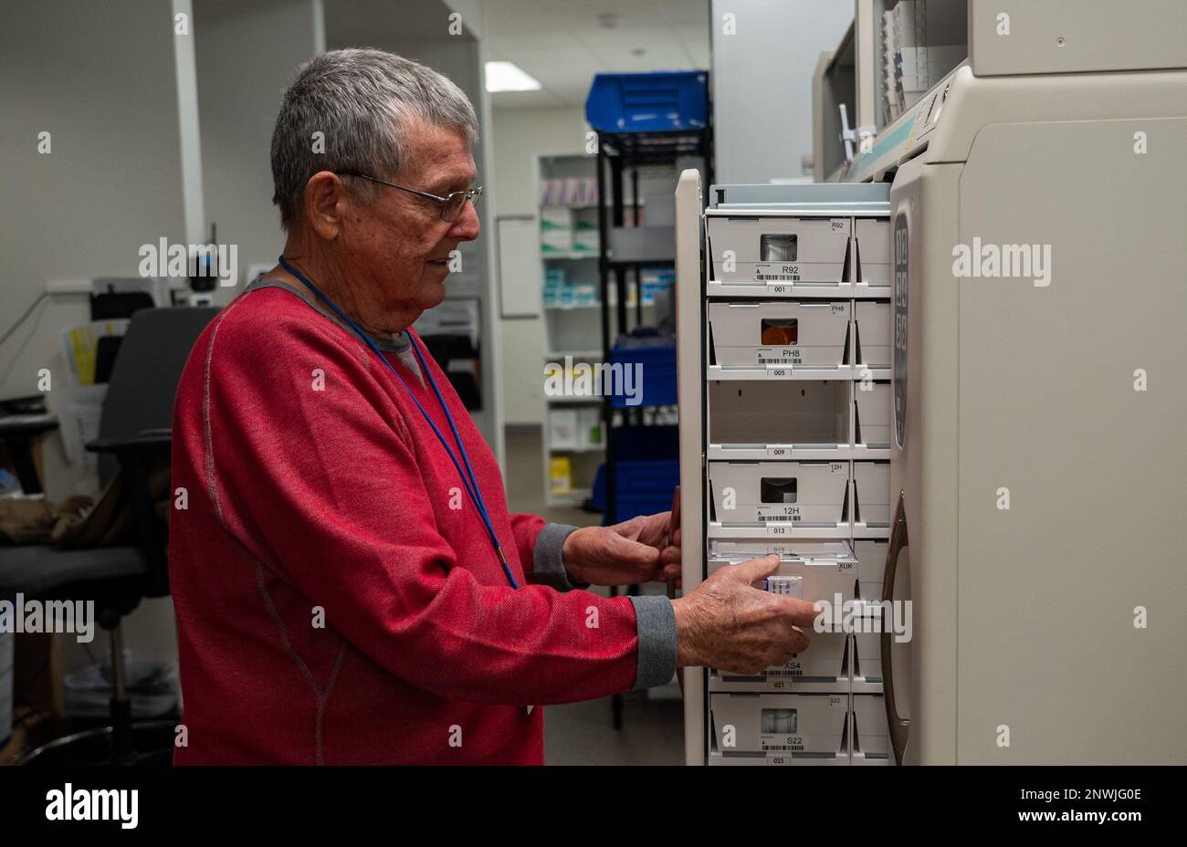 U.S. Air Force veteran Tom Siedel, 355th Medical Group Satellite Pharmacy volunteer, restocks pharmaceutical drugs at Davis-Monthan Air Force Base, Ariz., Jan. 17, 2023. Tom aids the 355th MDG mission by dedicating anywhere from 4-20 hours every week out of his own time to give back to the community. Stock Photo