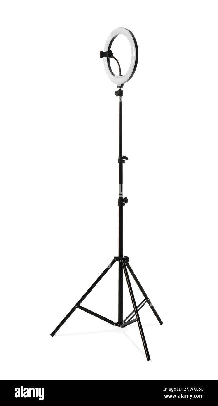 Modern tripod with ring light isolated on white Stock Photo - Alamy