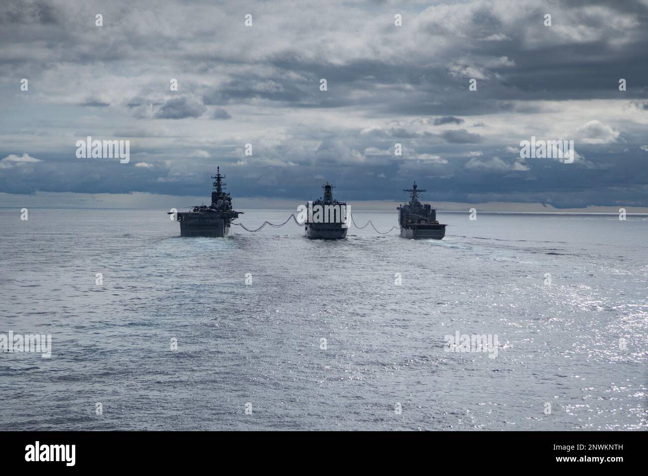 The USS Bataan (LHD-5) and USS refuels and receives supplies during a ...