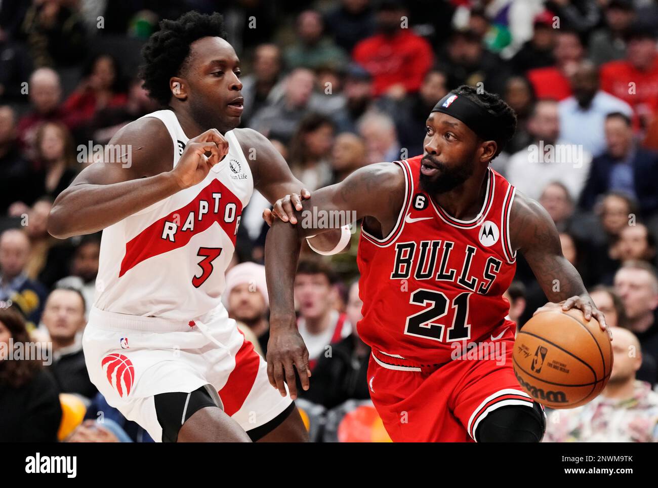 Chicago Bulls guard Patrick Beverley (21) tries to get past Toronto Raptors  forward O.G. Anunoby (3) during the first half of an NBA basketball game  Tuesday, Feb. 28, 2023, in Toronto. (Frank