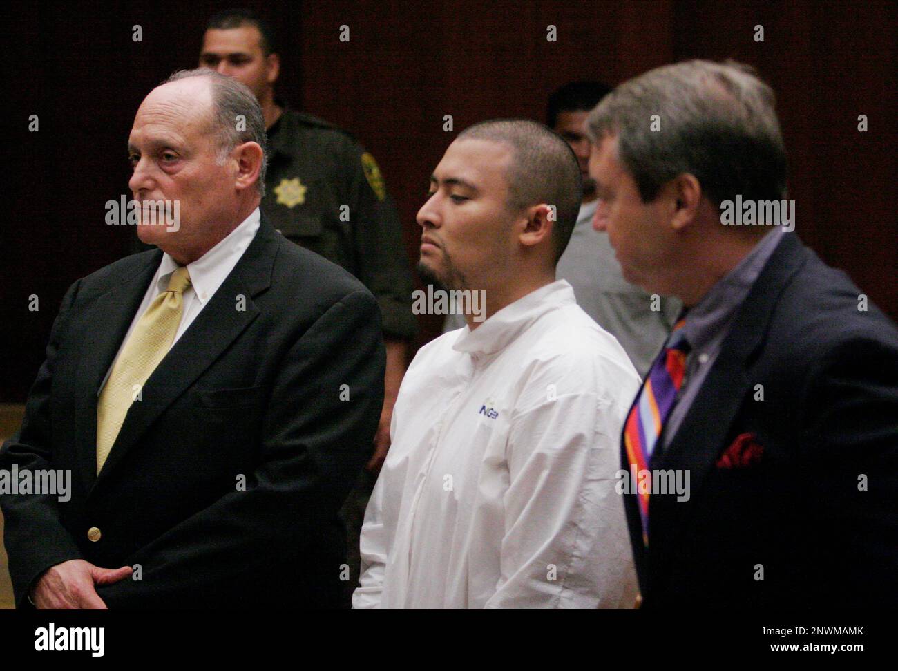 FILE - In this July 10, 2006, file photo, Adam Mau, center, is